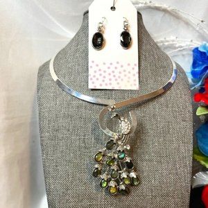 A Peacocks Pride Albacore and Silver Pendant and Earring Set.